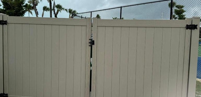 commercial vinyl privacy fence and gate