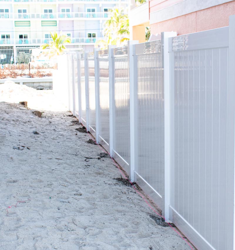 Vinyl fence installed on commercial waterfront property