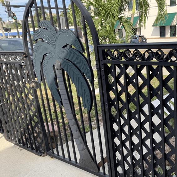 metal fence with decorative gate